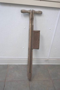 lot 64 image: antique Acme hand potato implement