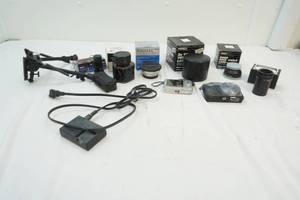 lot 100 image: cameras, lenses and monocular