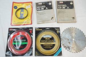 lot 102 image: band saw blades and table saw blade