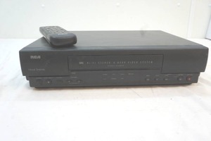 lot 129 image: RCA VCR with remote