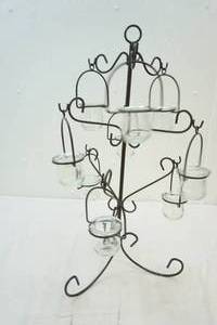 lot 152 image: metal and glass votive candle holder