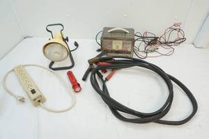 lot 155 image: battery charger, jumper cables, work light, surge protector