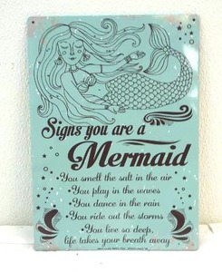 lot 219 image: Signs you are a mermaid metal wall art
