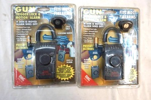 lot 222 image: gun trigger locks and motion alarms