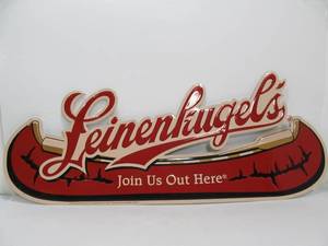lot 44 image: Large Embossed Metal LEINENKUGELS Canoe Beer Sign