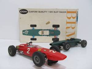 lot 135 image: 2 Vintage COX BRM Larger Slot Car Racers