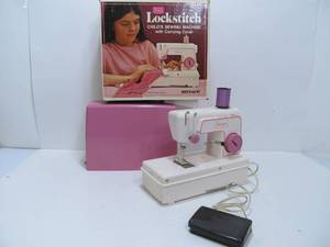 lot 140 image: Vintage Sears Lockstitch Toy Sewing Machine wBox