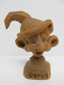 lot 194 image: Vintage Hand Carved Folk Art Dopey Seven Dwarves Carving