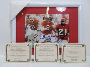 lot 285 image: Fantastic Authentic Autographed San Francisco 49ers Framed Photo - Jerry Rice, Steve Young & Deion Sanders