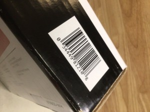 lot 74 image: Delta Morgan Elongated Closed Front Toilet Seat with NoSlip Bumpers in White Customer return see pictures