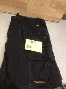 lot 5 image: DEWALT ProTradesman Combo Mens 38 in. W x 31 in. L Black PolyesterCottonElastane Stretch Work Pant with Knee Pad Customer Returns See Pictures