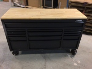 lot 106 image: Husky 61 in. W x 23 in. D Heavy Duty 15-Drawer Mobile Workbench Tool Chest with Solid Wood Top in Matte Black Customer Returns See Pics
