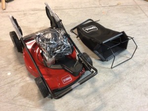lot 103 image: Toro 22 in. Recycler Briggs & Stratton High Wheel FWD Gas Walk Behind Self Propelled Lawn Mower with Super Bagger Customer Returns See Pics