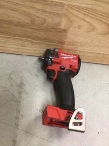 lot 59 image: Milwaukee M18 FUEL GEN-3 18-Volt Lithium-Ion Brushless Cordless 38 in. Compact Impact Wrench with Friction Ring (Tool-Only) Customer return see pictures