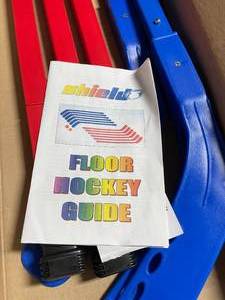 lot 214 image: Lot of 12 Floor Hockey Sticks.