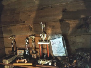 Collection of trophies and cars
