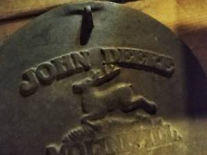 Metal John Deere sign
