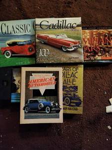 Car books, pens and cards