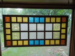 Multi-colored glass window panel