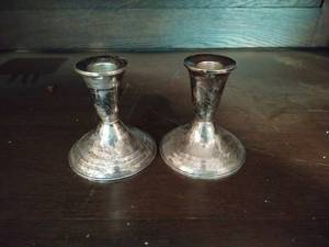 Pair of weighted sterling silver candle-sticks