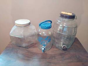 A candy jar and 2 water coolers