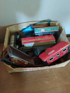 Vintage toy train cars and tracks