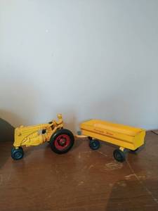 Vintage die-cast toy tractor and trailer