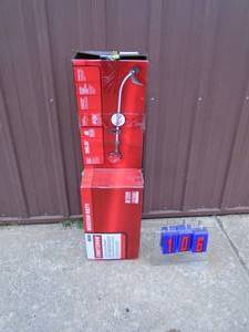 lot 106 image: Craftsman 4 cycle medium duty curved shaft weed trimmer. Appears lightly used in the box. As shown.
