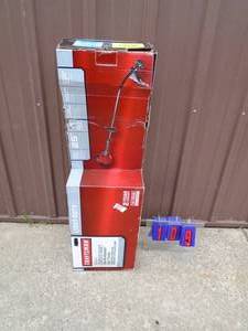 lot 109 image: Craftsman 2 cycle curved shaft weed trimmer. Looks nearly new. As shown.