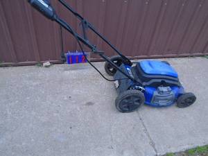 lot 112 image: Kobalt 110 volt lawn mower. Tested & works but has no blade. As shown.
