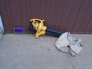lot 114 image: Yard Machine 2 cycle blowervac with bag. Tested & works. AS shown.