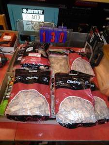 lot 130 image: Qty og 9 bags of smoker chips. As shown.