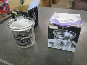lot of 2 style man ashtrays ...