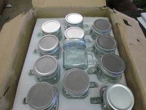 case of 24 jars with handles , ring...