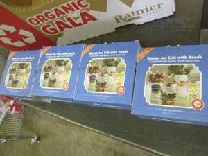 4 boxes of mason jar lids with band...