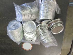 lot of mason jar lids ...