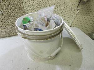 lot 133 image: (EW7) Bucket Full of Misc Nails Scr...