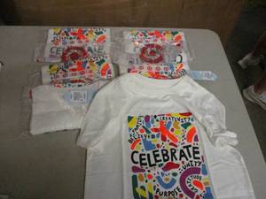 6 Small T-shirts...