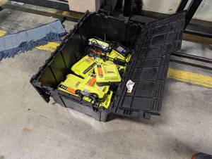 lot 298 image: Bin of Ryobi 40V Rapid Battery Chargers
