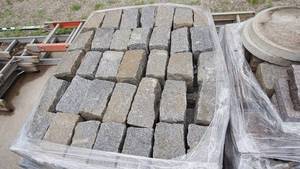 lot 7 image: Pallet of gray granite cobblestone