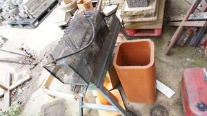 lot 12 image: Miscellaneous lot including aluminum sawhorse, live trap, concrete planter etc.