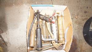 lot 33 image: Lot of grease guns in box