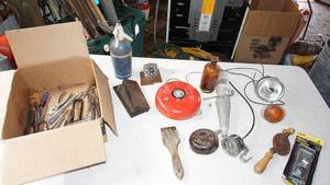 lot 55 image: Fun miscellaneous garage lot including vintage head lights, metal fire alarm etc.
