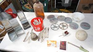 lot 60 image: Another fun man cave lot including vintage metal drill bit containers, large softball, brown glass jug etc.