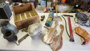 lot 81 image: Scotsman wood  crate of vintage treasures including coupling from well pump, aluminum cast covered pot, vintage portable electric coil burner etc.