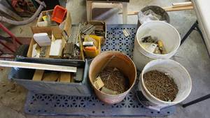 lot 71 image: Lot of multiple size hinges, buckets of nails etcpallet included