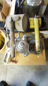 lot 84 image: Miscellaneous lot including vintage pesticide sprayers, vintage singer handheld vacuum cleaner, paper roller, vintage sportsman lantern etc.