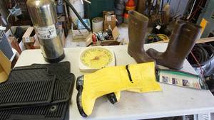 lot 97 image: Lacrosse size 12 mud boots, Slush-Eze water rubber boots size 78, vintage fire extinguisher, rubber car floor mats etc.