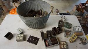 lot 113 image: Galvanized bushel basket with assorted electrical hardware