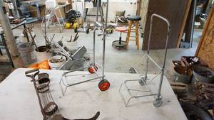 lot 115 image: Vintage potato planter, two vintage suitcase carts